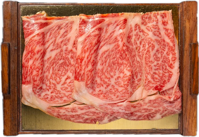 A5 wagyu laid out on a wooden board